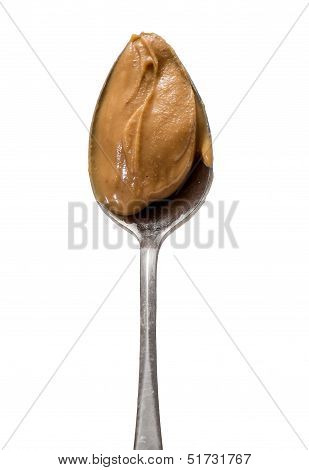 Peanut Butter Served with a Spoon Isolated on a White Background