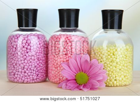 Aromatherapy minerals - colorful bath salt on light background