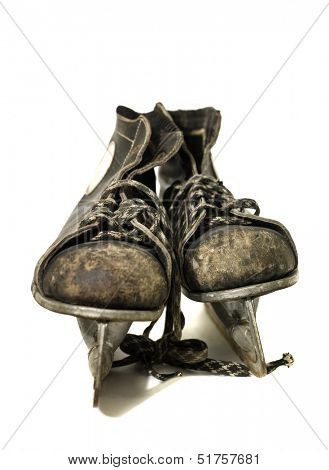 Worn ice-skates isolated on white background