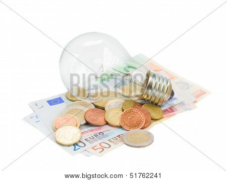 common lamp bulb on euro money