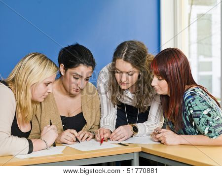 Four girls groupwork in the classroom