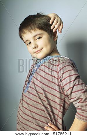 Young Smiling Boy Standing