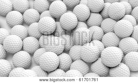 Many golf balls together closeup isolated on white 