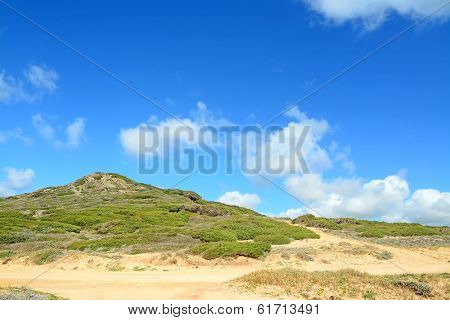 Blue Sky Over A Green Hill