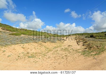Clouds Over A Green Hill