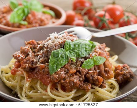 spaghetti bolognese with ragout sauce and parmesan cheese