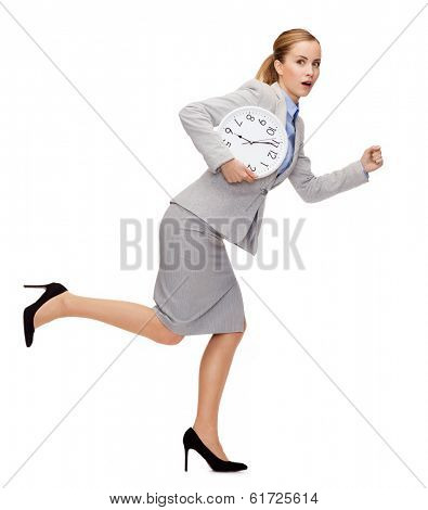 business, time and education concept - stressed young businesswoman with clock running
