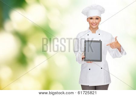 cooking, technology and food concept - smiling female chef, cook or baker with tablet pc computer blank screen