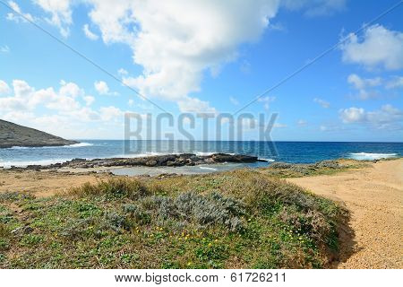 Clouds Over Argentiera Rocky Shore