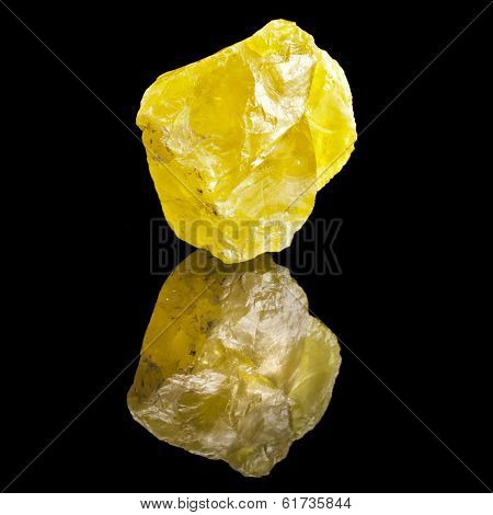 Large Crystal Yellow Sulphur with reflection on black surface background 