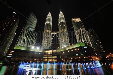 KUALA LUMPUR, MALAYSIA - AUGUST 31: Petronas Twin Towers at night on August 31, 2012 in Kuala Lumpur. Petronas Twin Towers  were the tallest buildings (452 m) in the world from 1998 to 2004.