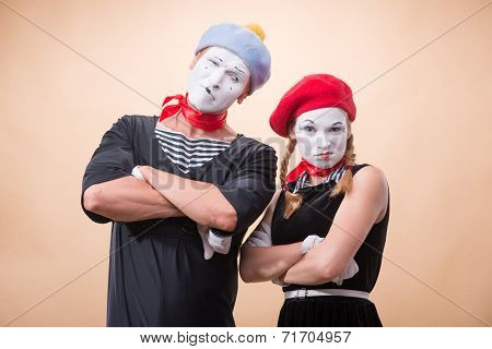 Couple of two funny mimes isolated on background