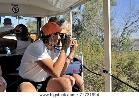 Tourists In The Tourist Train To Visit The Salt Business