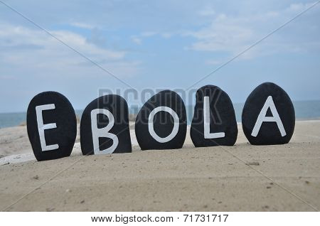 Ebola concept word on black stones