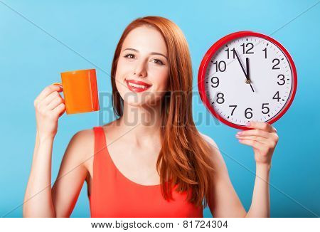 Redhead Girl With Tea Cup And Huge Clock On Blue Background.
