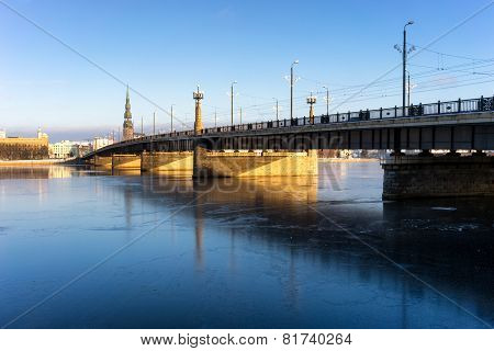 Bridge Over The Frozen River Daugava In Riga In Winter