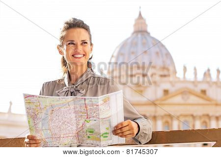 Happy Young Woman With Map On Piazza San Pietro In Vatican City