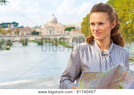 Happy Young Woman With Map On Bridge Ponte Umberto I With View O