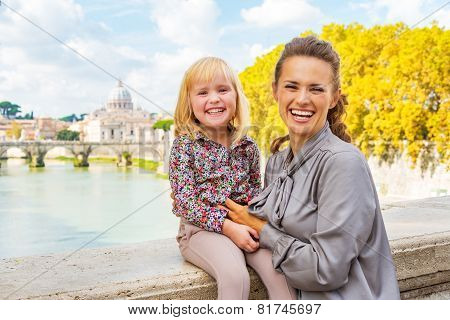 Portrait Of Happy Mother And Baby Girl On Bridge Ponte Umberto I