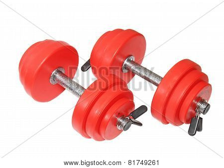 A Sporting Equipment - Two Red Dumbbells. Isolated