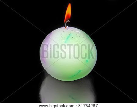 Green Candle On Black .