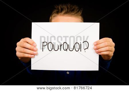Child Holding Sign With French Word Pourquoi - Why