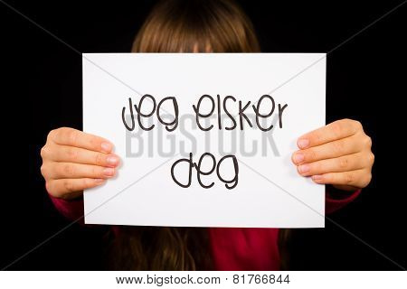 Child Holding Sign With Norwegian Words Jeg Elsker Dig - I Love You