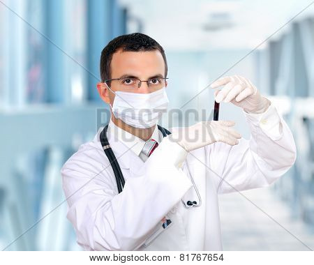 Doctor  Resarch A Medical Test Glass With Blood.