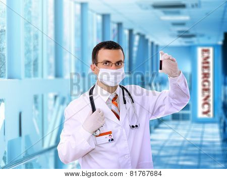 Doctor  Resarch A Medical Test Glass With Blood.