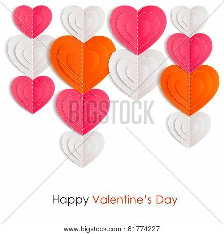 Valentines day background with paper hearts isolated on white background.
