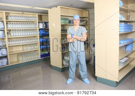 Medical staff sterilizing hands and arms before surgery