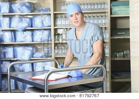 Medical staff sterilizing hands and arms before surgery