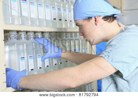 Medical staff sterilizing hands and arms before surgery