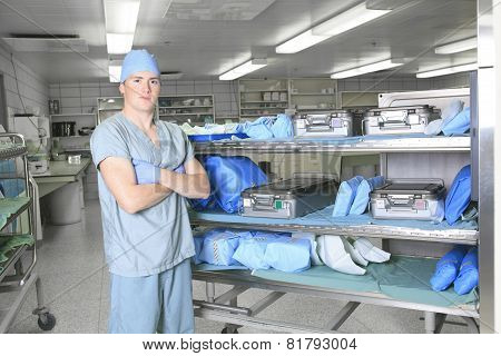 Medical staff sterilizing hands and arms before surgery