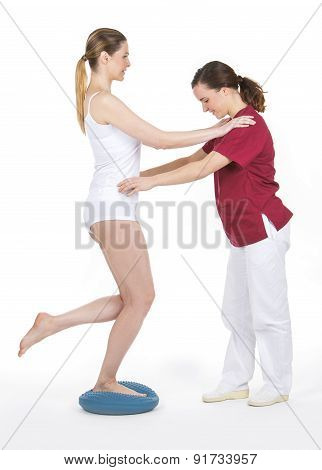 physiotherapist doing rehabilitation