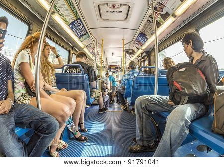People In The Downtown Metro Bus In Miami, Usa