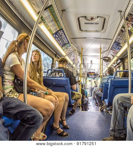 People In The Downtown Metro Bus In Miami, Usa