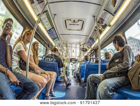 People In The Downtown Metro Bus In Miami, Usa