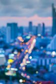 Blur bokeh of city road after sunset