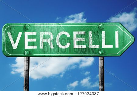 Vercelli road sign, on a blue sky background