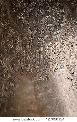 Tarnished Silver Scrollwork Background