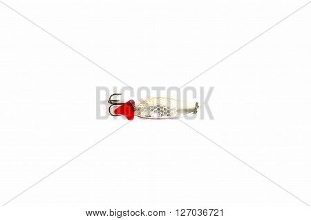 Metal fishing lure with sharp hooks for catching predatory fish.