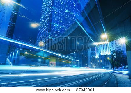 light trails through the footbridge,hongkong china.