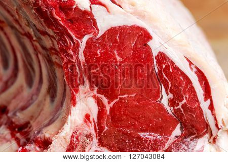 Fresh Raw Beef bone ribs roughly choppid. close up.
