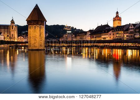 Lucerne, Switzerland - August 2: Views Of The Famous Bridge Kapellbruecke At Sunset In Lucerne On Au