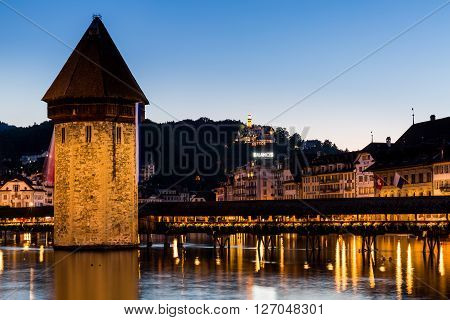 Lucerne, Switzerland - August 2: Views Of The Famous Bridge Kapellbruecke At Sunset In Lucerne On Au