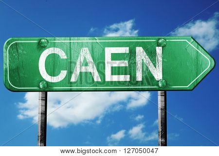 caen road sign, on a blue sky background