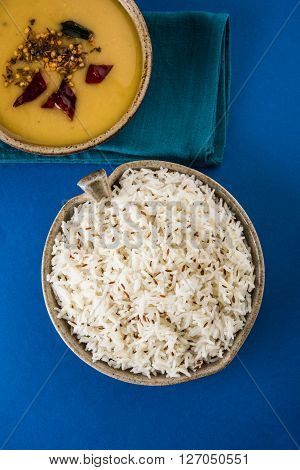 Whole Yellow Lentil with Rice, dal tadka and jeera rice, Indian Dish, cooked rice and cooked Arhar or Toor dal (Pigeon Pea)
