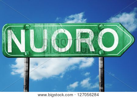 Nuoro road sign, on a blue sky background