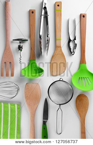Set of stainless and wooden utensils, isolated on white